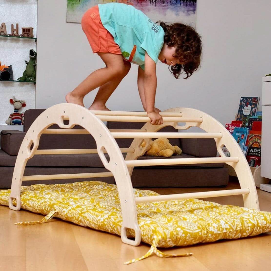 Arch - Rocker with Sunny Pattern Pillow in indoor play setup - Kidodido