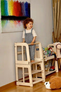 Toddler using the Montessori Learning Tower to help in the kitchen - Kidodido