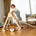 Child climbing on the Montessori Triangle Climber - Kidodido