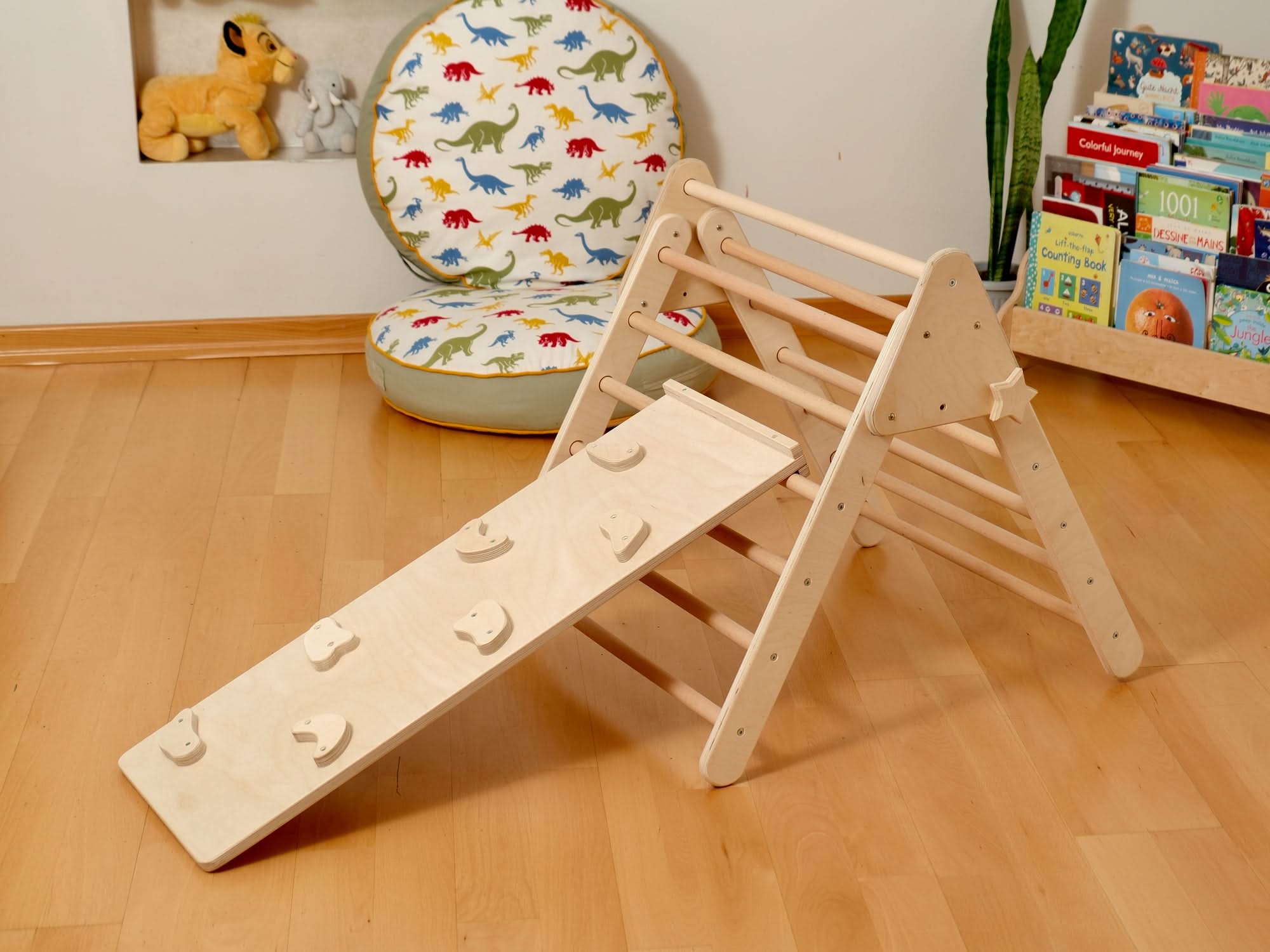 Montessori indoor playground set with Pikler triangle and slide for toddlers, fostering active play and learning.