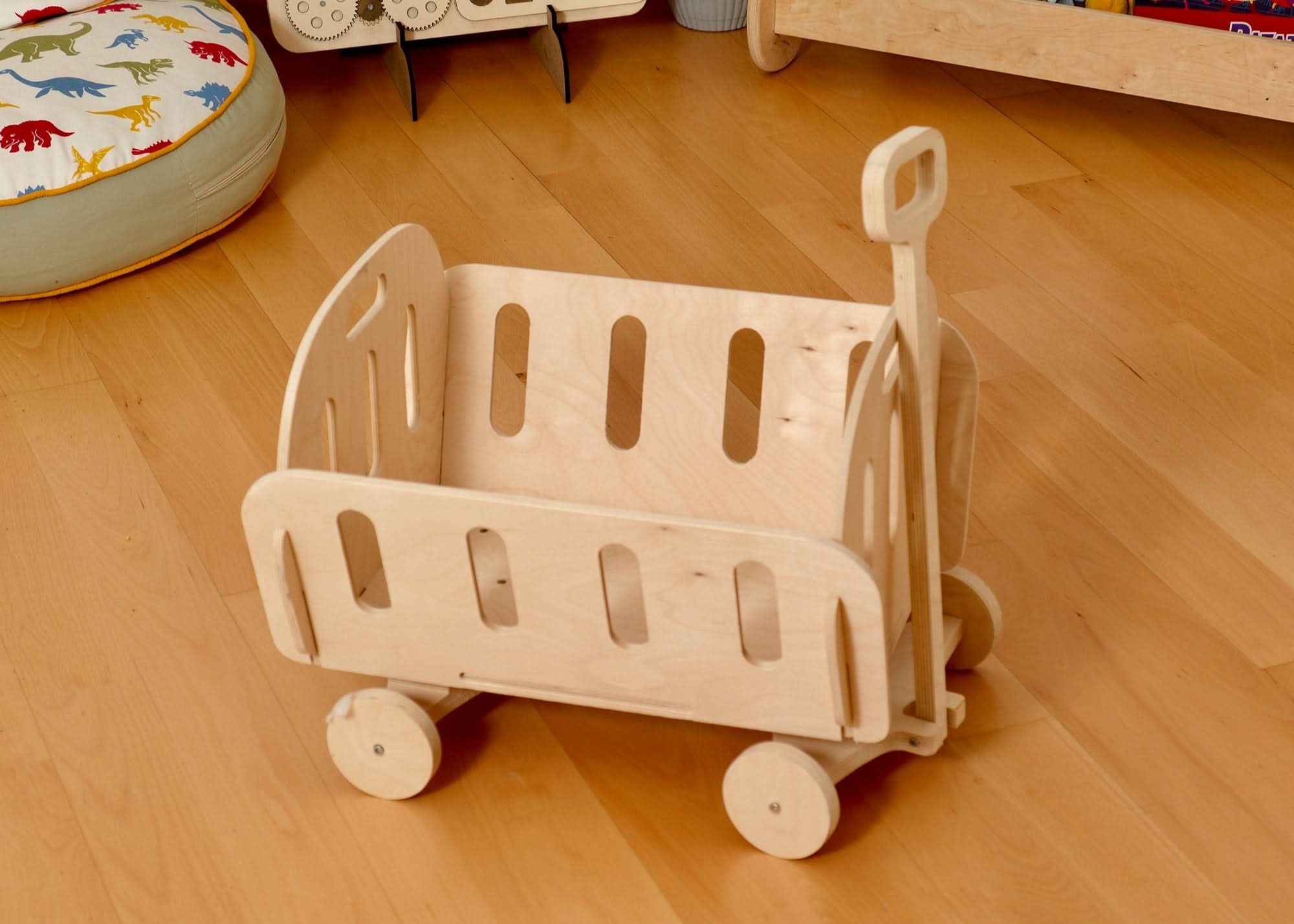 Montessori wooden toy storage organizer on wheels for kids' playroom, eco-friendly and stylish design.