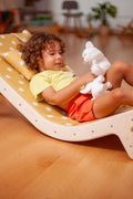 Child relaxing on the Adjustable Lounge Chair - Kidodido