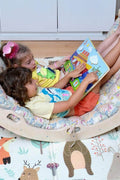 Child playing on the Wooden Climbing Arch Rocker - Kidodido