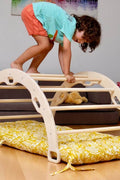 Arch - Rocker with Sunny Pattern Pillow in indoor play setup - Kidodido