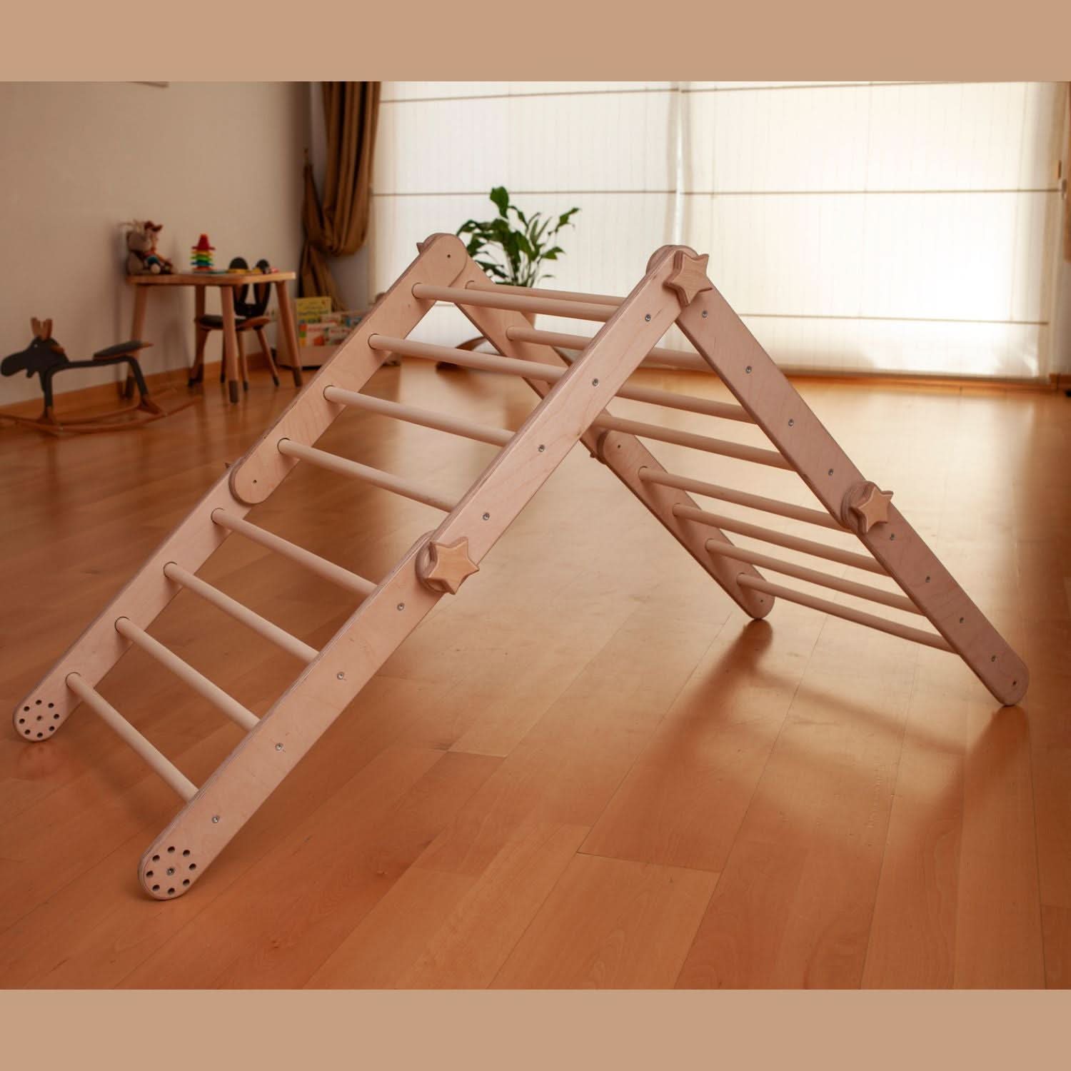 Wooden climbing toy on a wooden floor with a neutral background